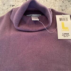 Cashmere sleeveless turtleneck